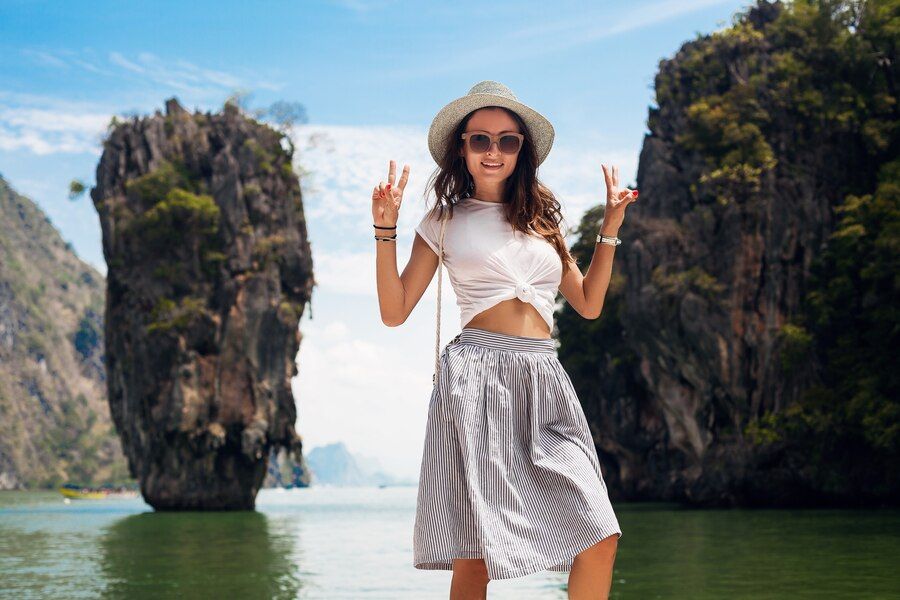 young-beautiful-woman-traveling-thailand-summer-vacation-casual-style-sunglasses-hat-cotton-skirt-t-shirt-smiling-happy-adventures_285396-5793.jpg