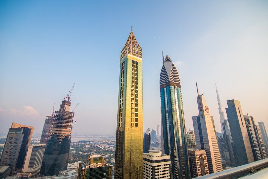 scenic-aerial-view-downtown-dubai-united-arab-emirates-with-skyscrapers-highways-colourful-travel-background_231208-7637.jpg