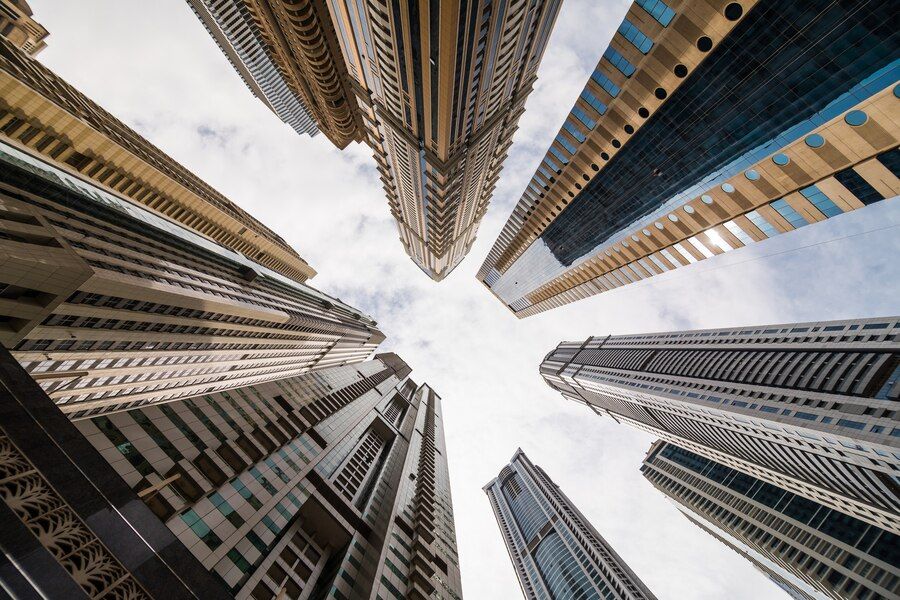 dramatic-perspective-with-low-angle-view-skyscrapers-looking-up-sky-dubai-vanishing-point_231208-7545.jpg