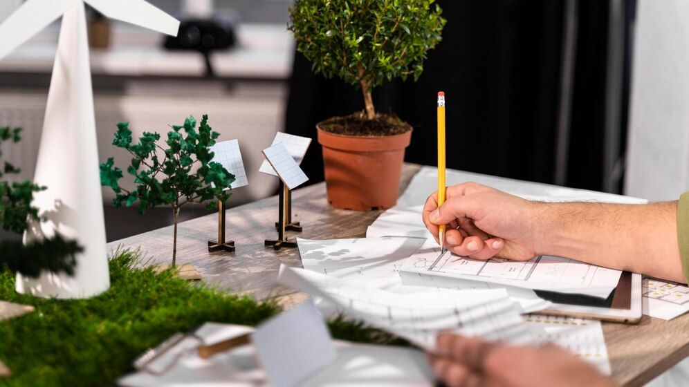 side-view-man-working-eco-friendly-wind-power-project-with-paper-plans_23-2148847790.jpg side-view-man-working-eco-friendly-wind-power-project-with-paper-plans_23-2148847790.jpg