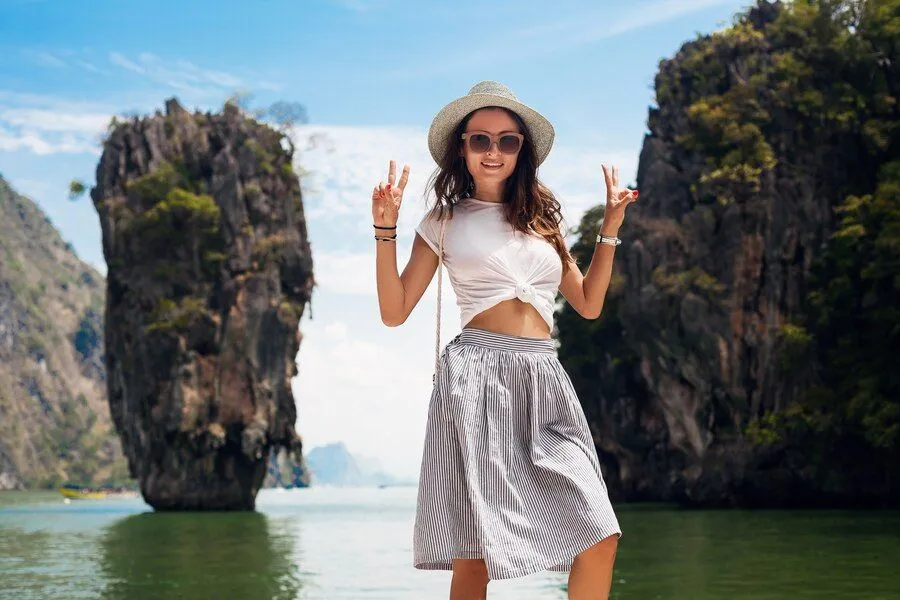 young-beautiful-woman-traveling-thailand-summer-vacation-casual-style-sunglasses-hat-cotton-skirt-t-shirt-smiling-happy-adventures_285396-5793.jpg
