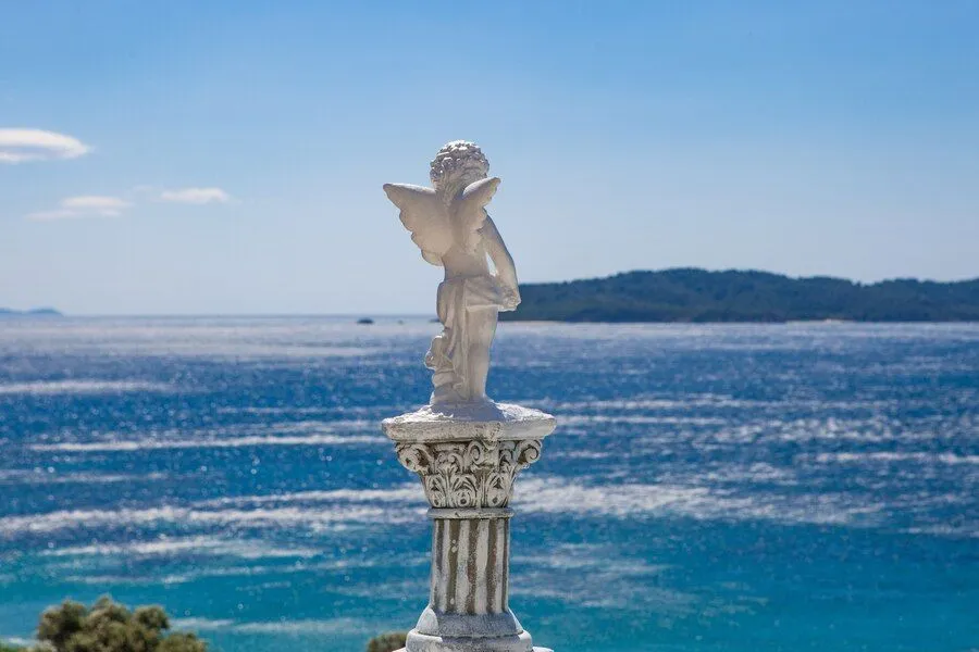 white-angel-statue-shot-from-with-blurred-sea_181624-10558.jpg white-angel-statue-shot-from-with-blurred-sea_181624-10558.jpg