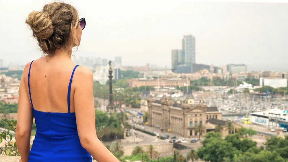 caucasian-woman-blue-dress-with-view-barcelona-background-spain_1268-18016.jpg
