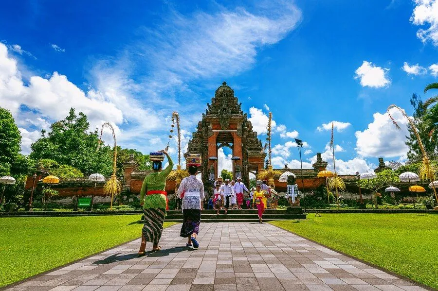 balinese-people-traditional-clothes-religious-ceremony-pura-taman-ayun-temple-bali-indonesia_335224-390.jpg