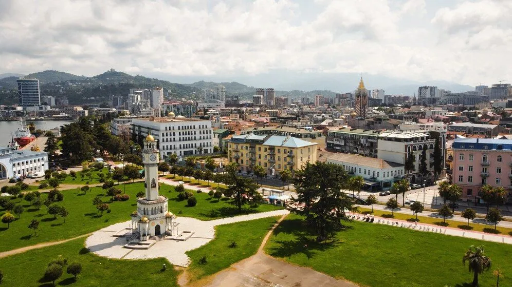 aerial-drone-view-batumi-georgia-old-modern-buildings-greenery-roads-mountains_1268-18386.jpg