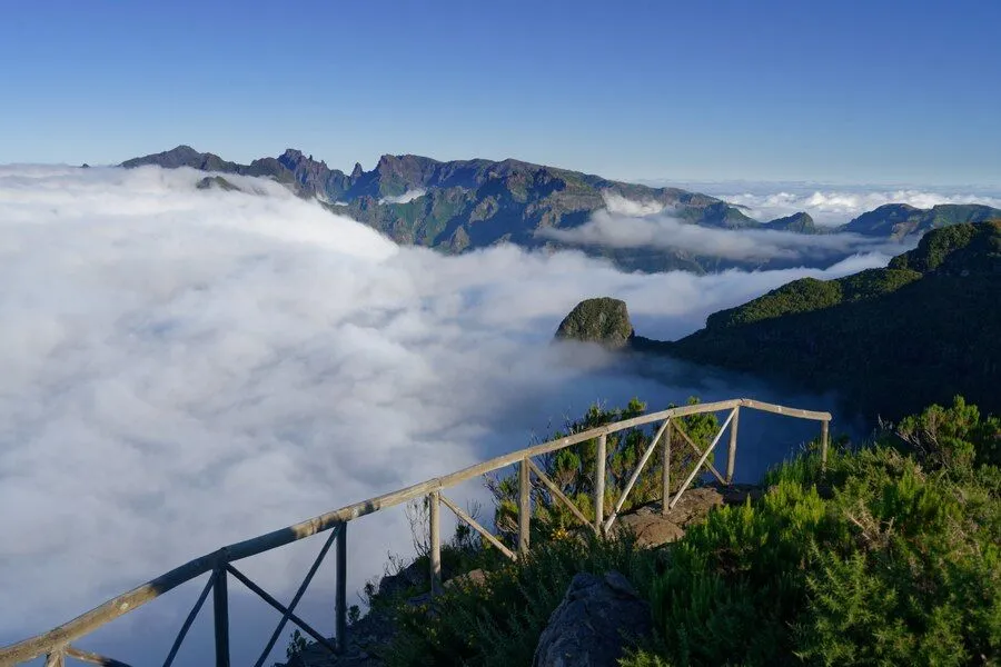 beautiful-shot-green-mountains-hills-covered-white-clouds-clear-sky_181624-2201.jpg